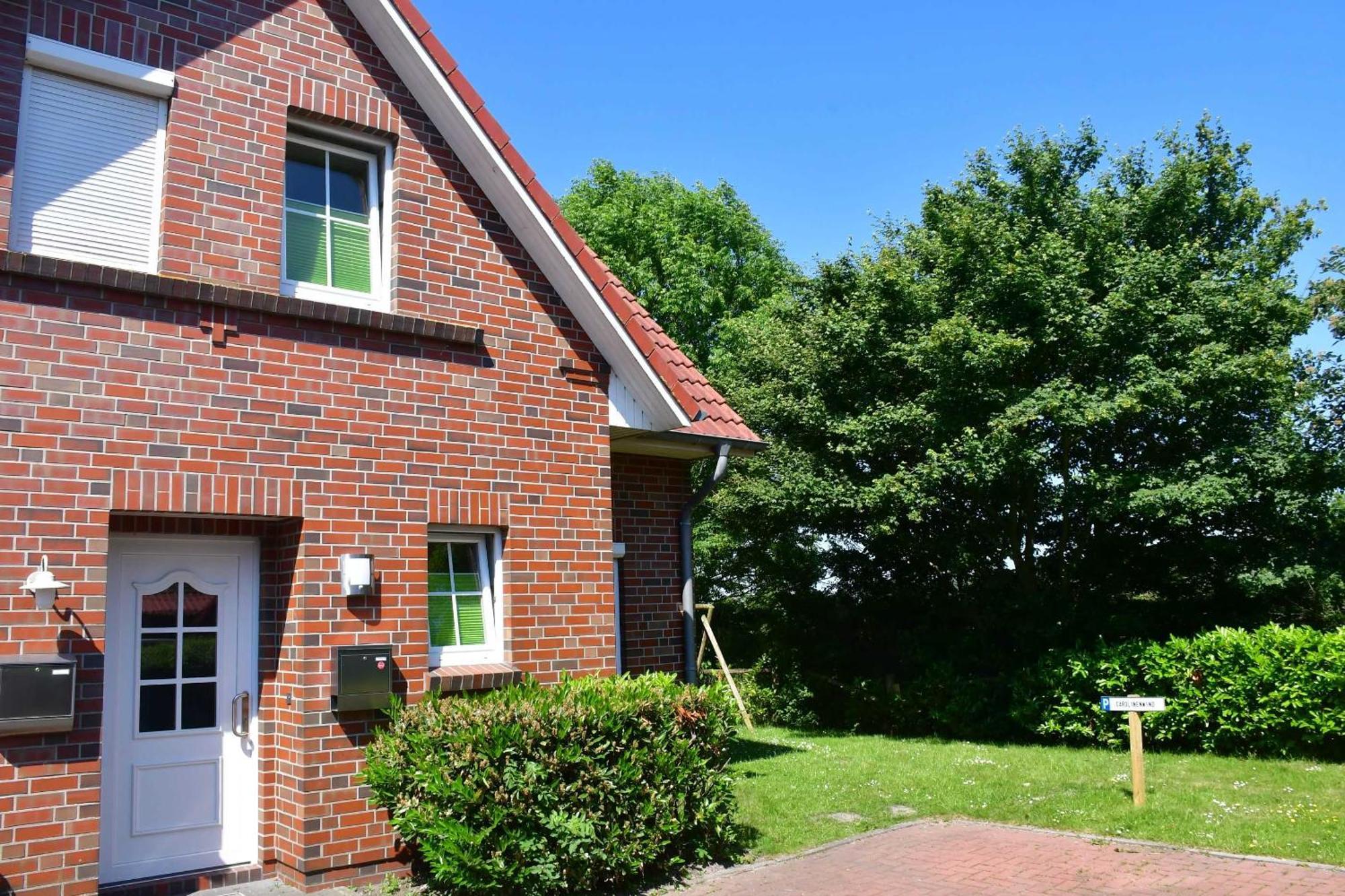 Ferienhaus Carolinenwind Carolinensiel Exterior foto